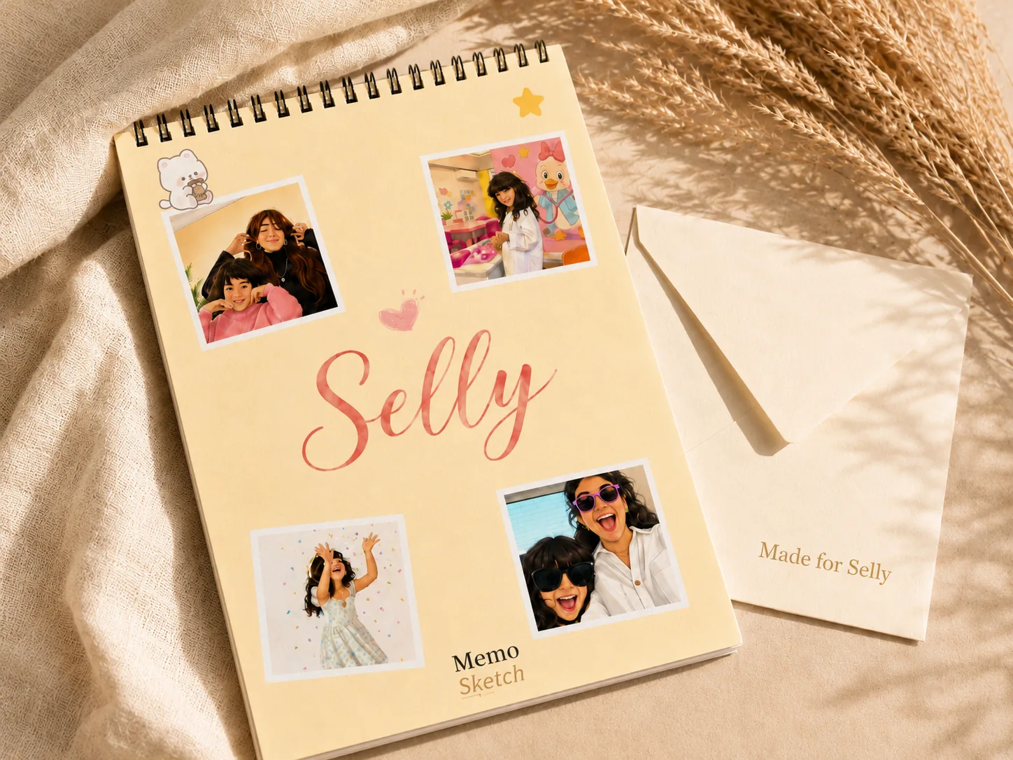 MemoSketch coloring book and personalized envelope on a warm linen surface